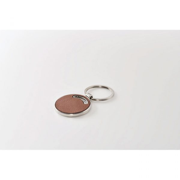 Porte-clés en métal de forme ronde avec incrustation en cuir PU recyclé.